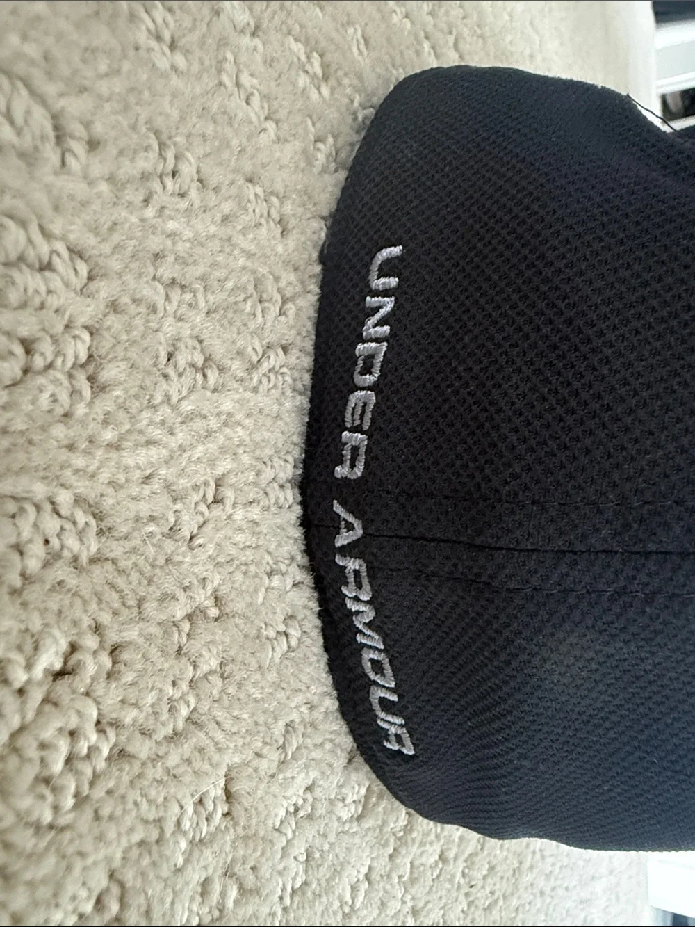 Under Armour youth black hat size small / medium with embroidered logo